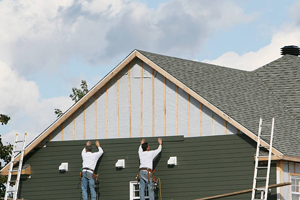 Professional Emergency Siding Repair technician working in Cedar Grove, IN